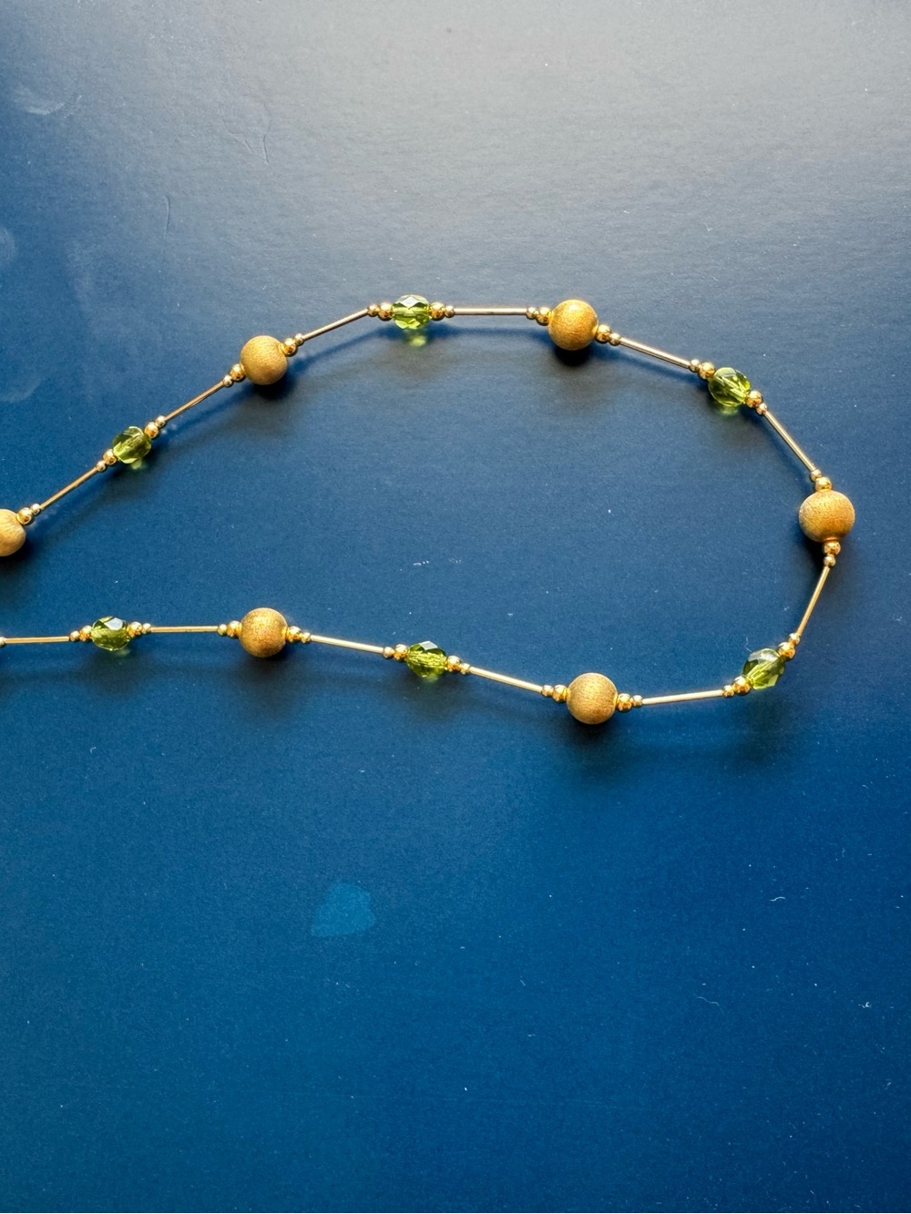 Gold Bead Necklace with Olive Green Crystal Accents